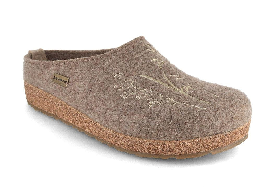 HAFLINGER Grizzly Meadow showing a mottled taupe felt upper with subtle meadow appliques