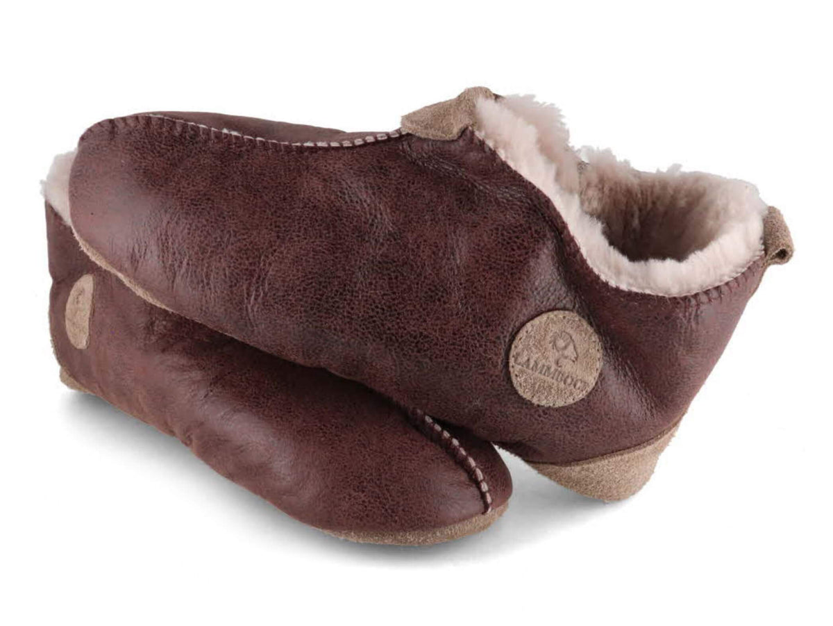 Pair of Lammbock Texel brown shearling slipper boots, rear three-quarter view
