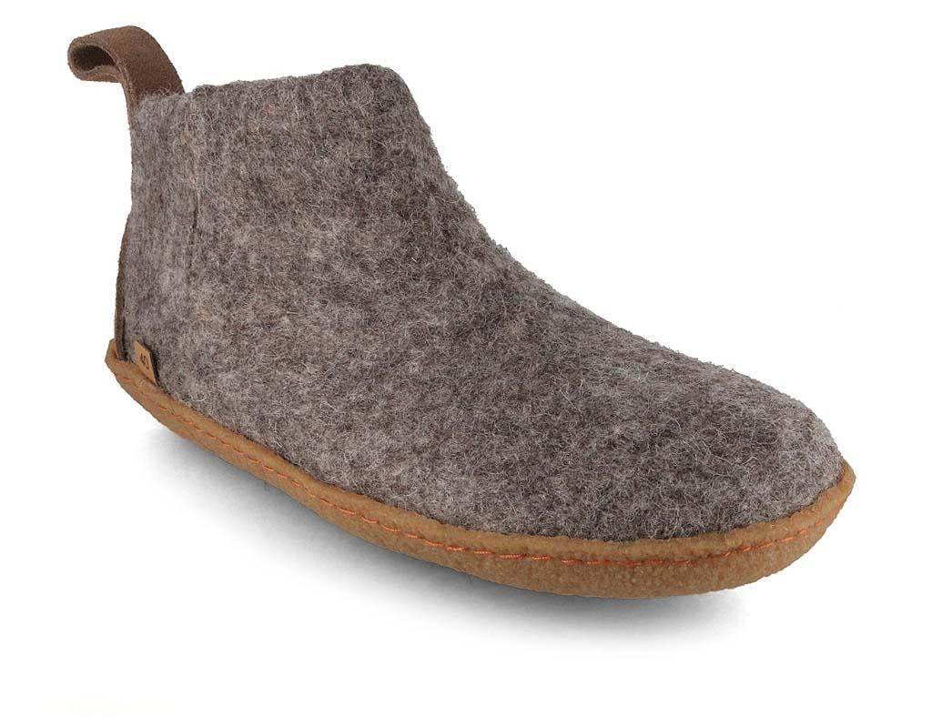 WoolFit Yeti showing a stone-gray ankle-high felt boot with a natural-rubber sole