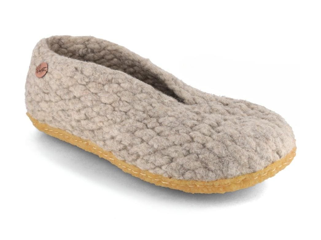 WoolFit Woolies showing a natural-beige hand-woven wool upper with a textured surface