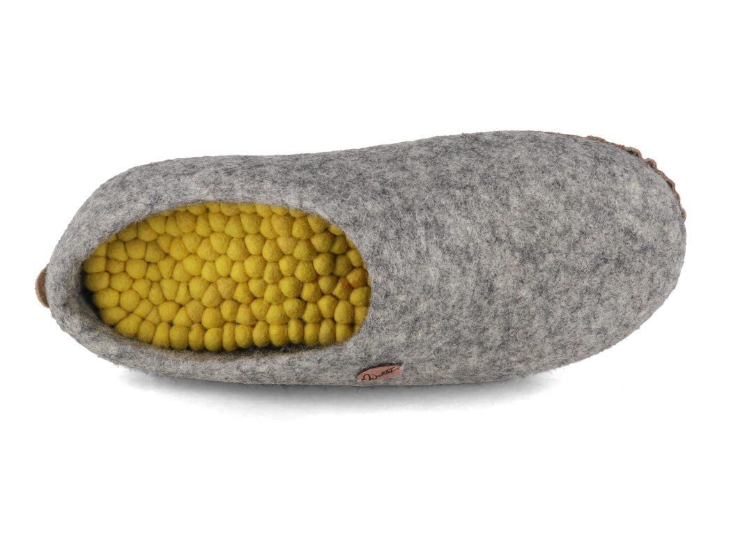WoolFit FeelGood yellow footbed inside a gray felt slipper