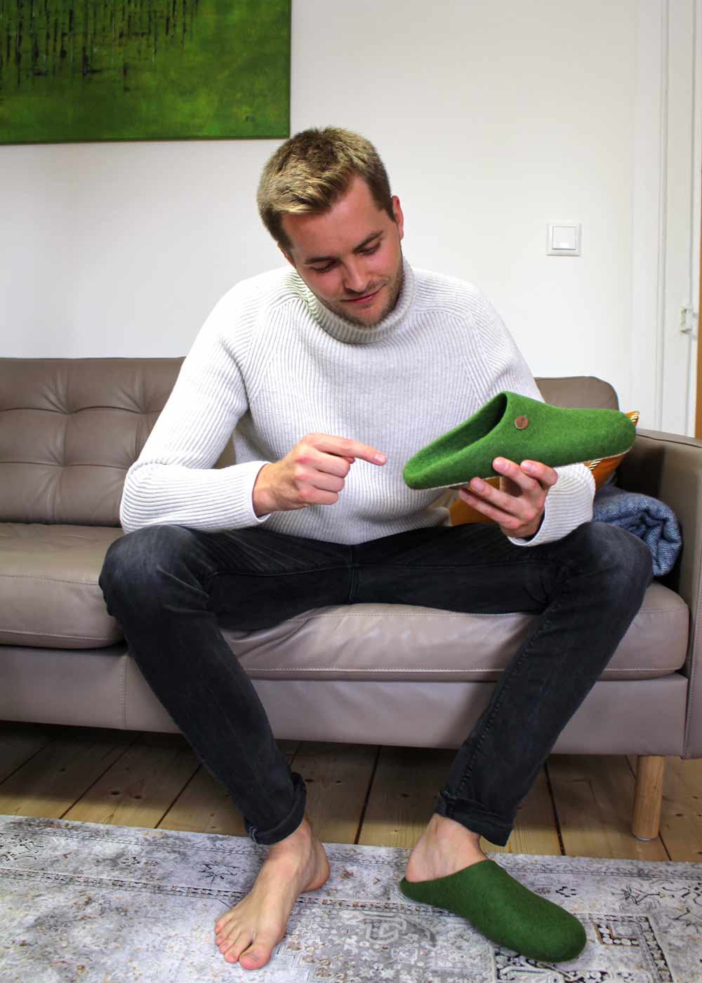 WoolFit Tibet Hand-Felted Wool Slippers in Grass Green, wool felt, lifestyle / pair view; hero front three-quarter