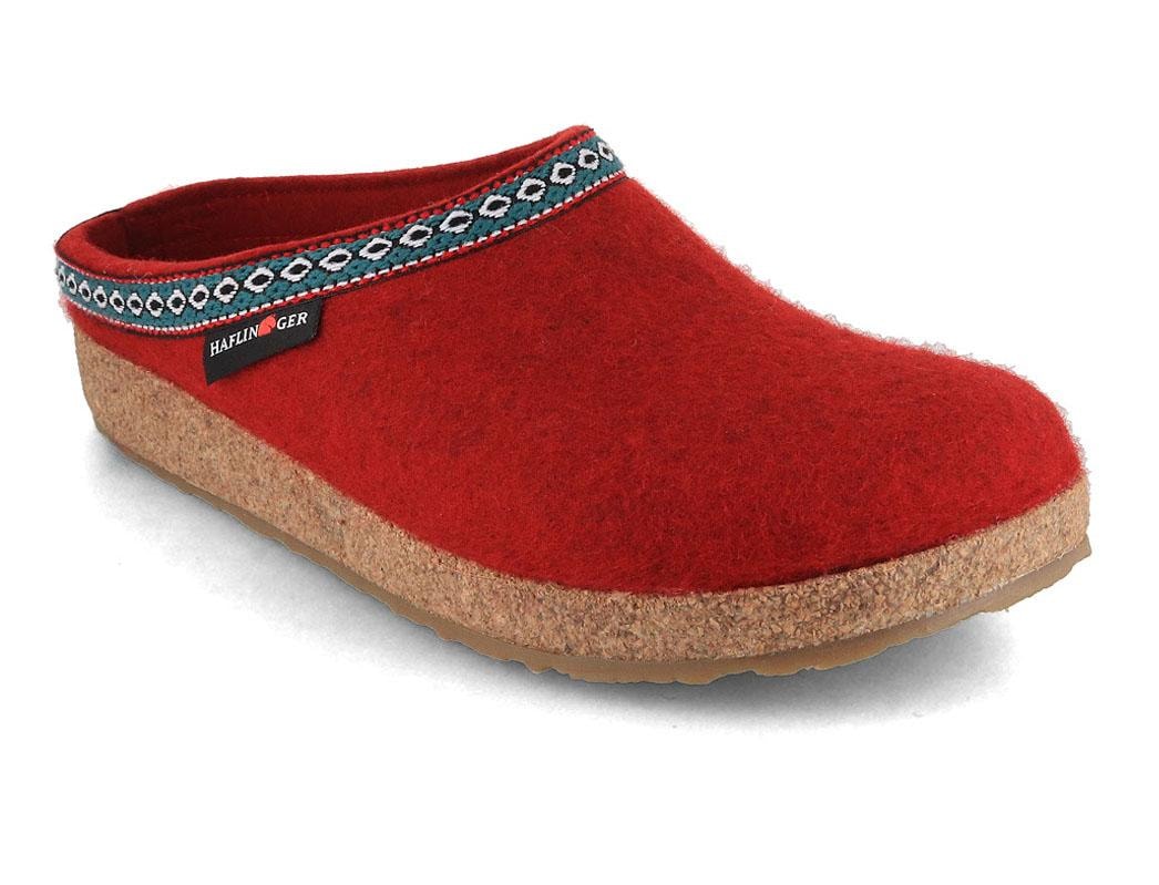 HAFLINGER Grizzly GZ paprika red showing a paprika-red felt upper with a multicolor woven collar
