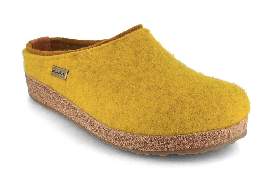 HAFLINGER Grizzly Kris curry yellow showing a curry-yellow felt upper with a tonal cork edge