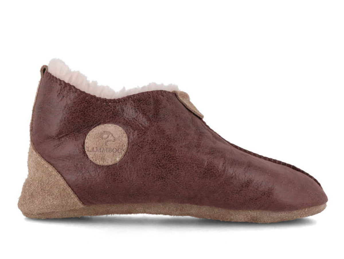 Lammbock Texel brown shearling slipper boot, side profile with logo patch