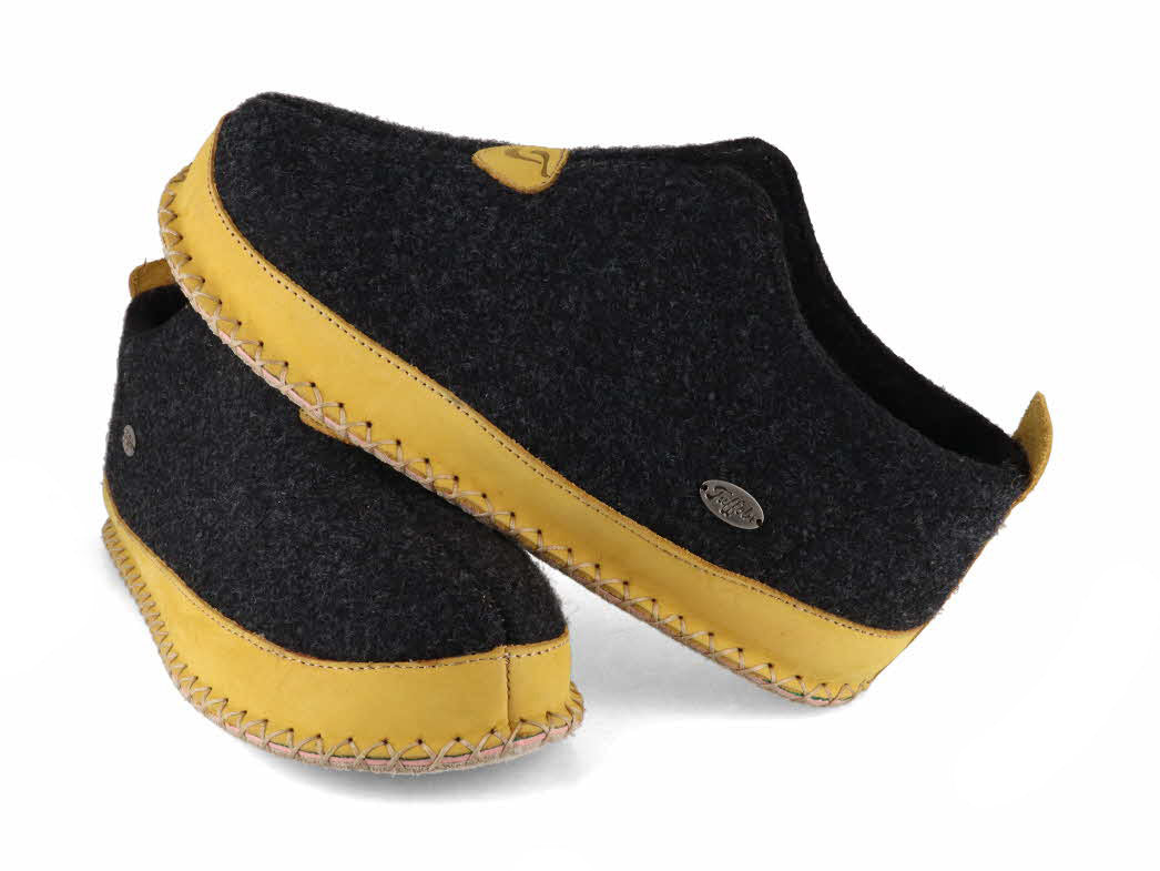 Tuffeln Urig gray and yellow wool slippers, paired three-quarter view
