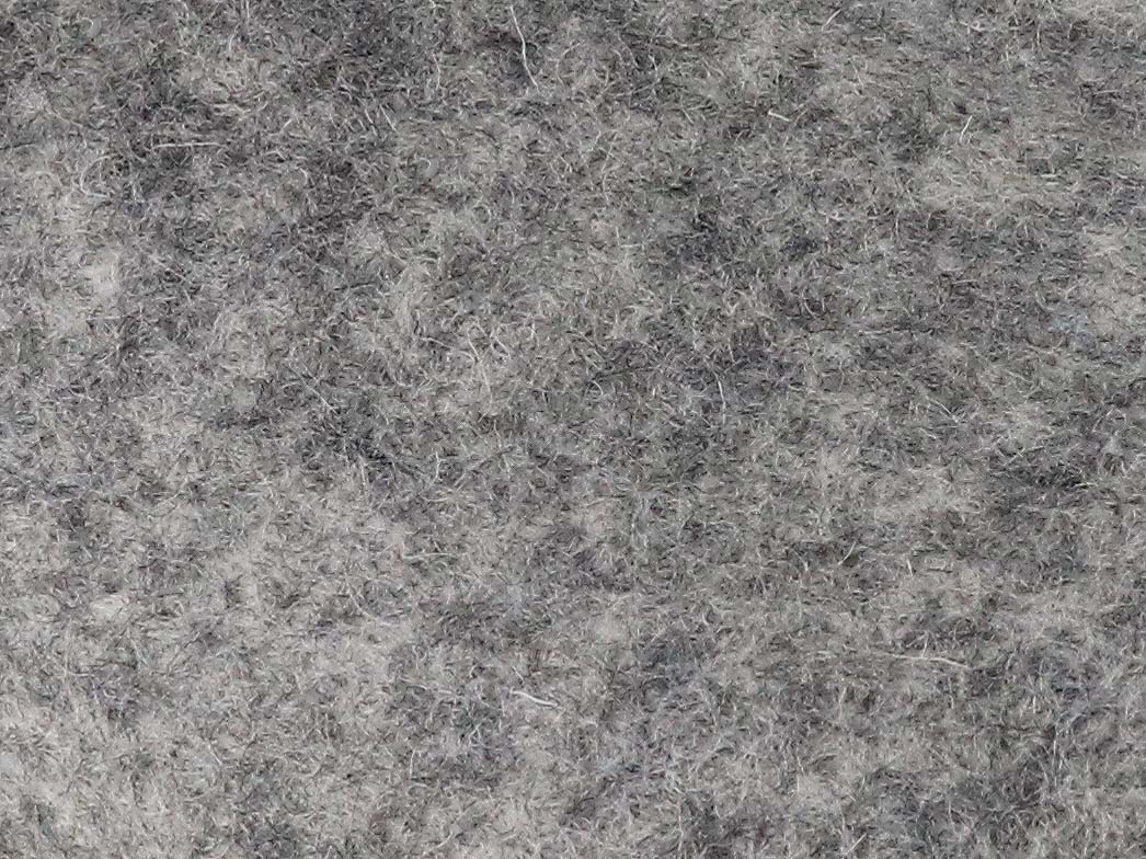 Tuffeln Pantuffel light gray wool felt slippers felt surface, close-up